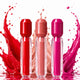 Three liquid lipstick tubes with colour splash